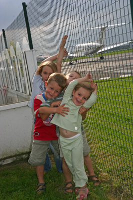 Airport kids caught by a serious crosswind