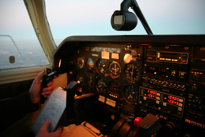 Cockpit lights coming on at dusk