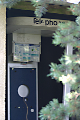 Broken telephone booth