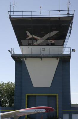 Our Cessna refelecting in the Tower of Merville (LFQT)